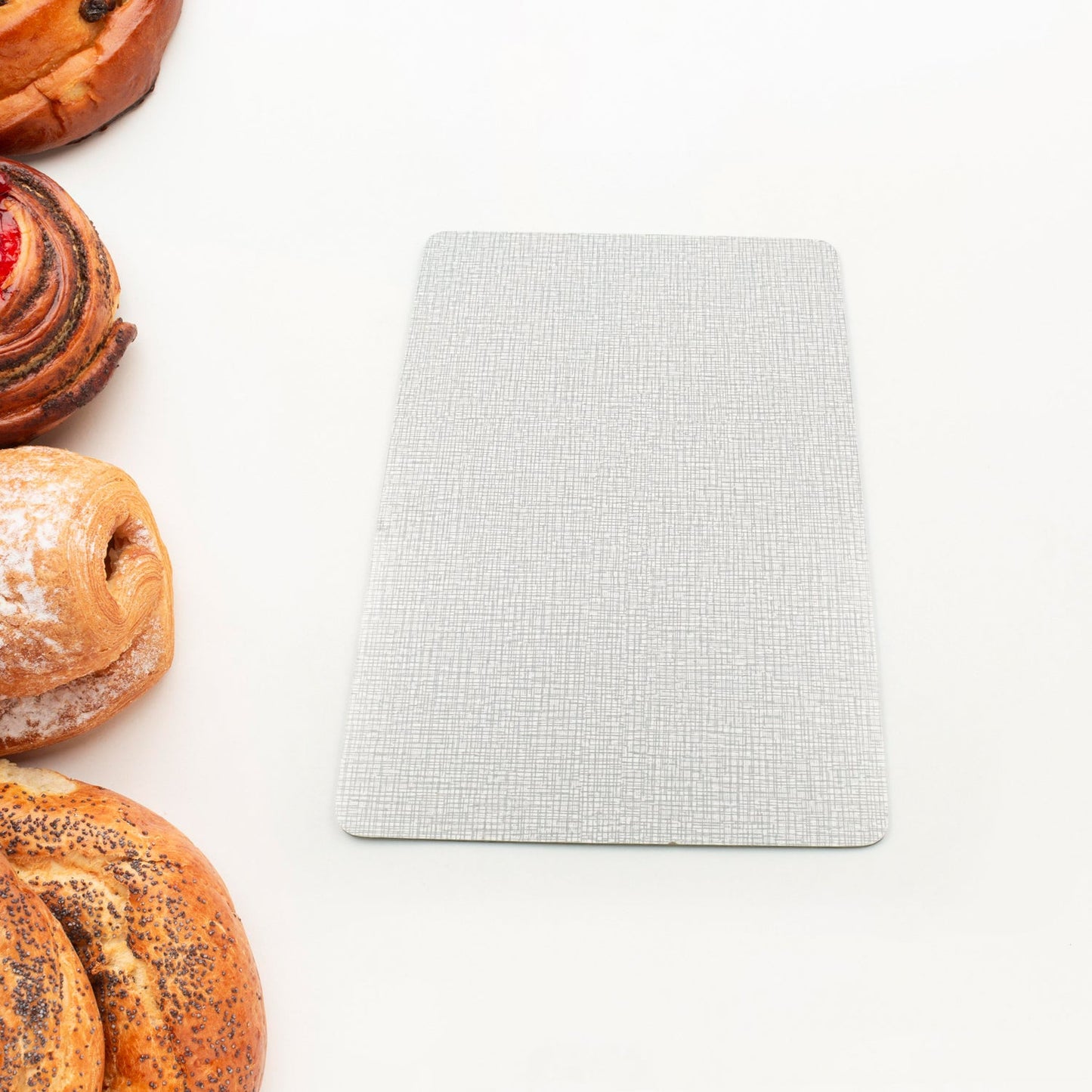 Cutting board with a knife and chopped ingredients, ideal for everyday kitchen tasks.