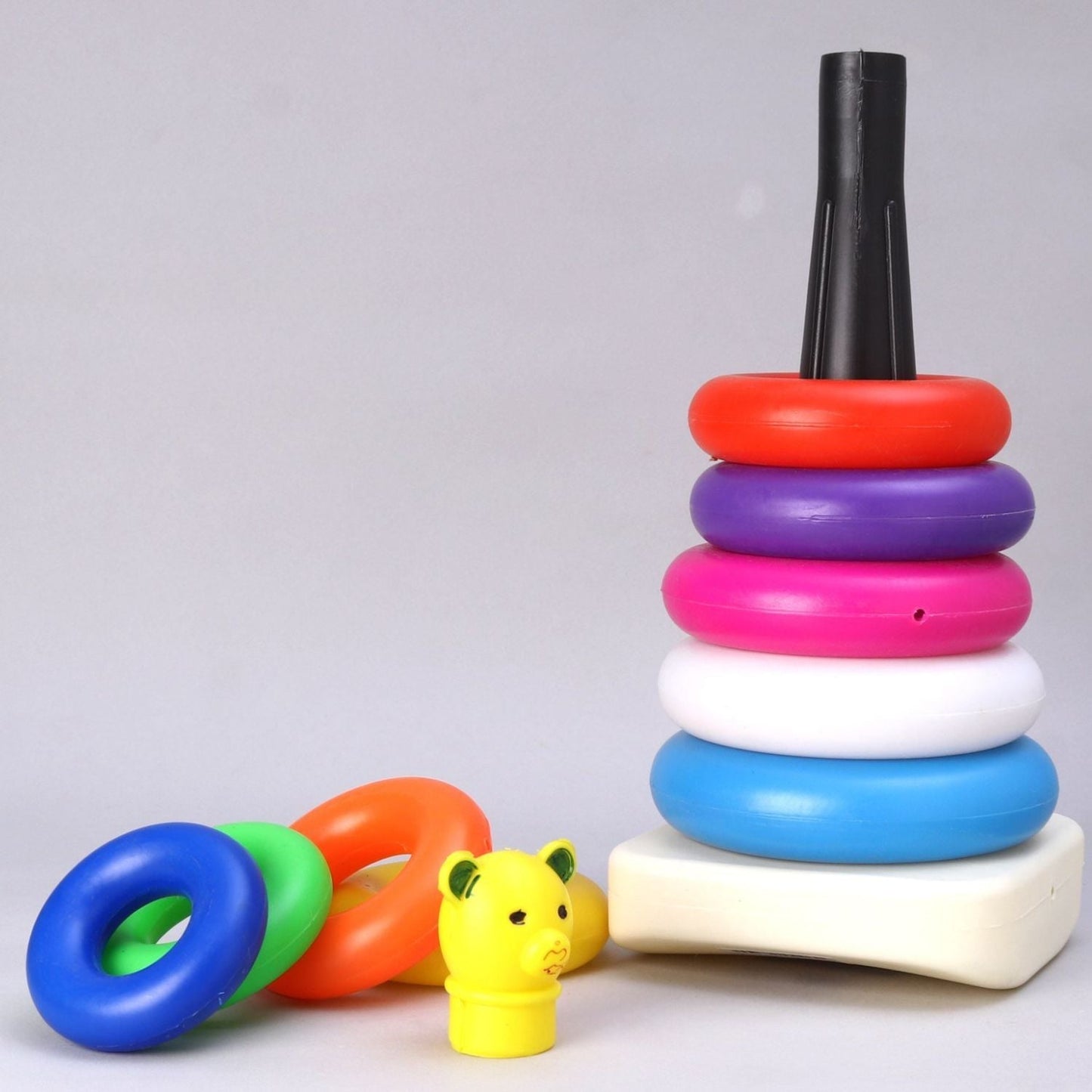 Educational stacking toy with teddy bear rings in various colors